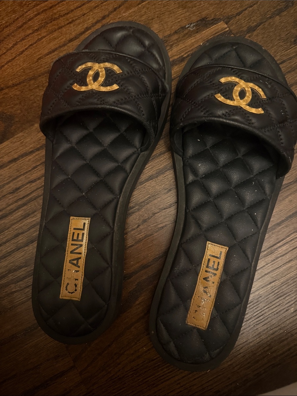 CHANEL Black Quilted Slide Sandals with Gold CC Emblem